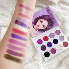 Close-up of deep purple and lavender eyeshadows with shimmer finish in Kawaii Gothic palette, showcasing velvety texture