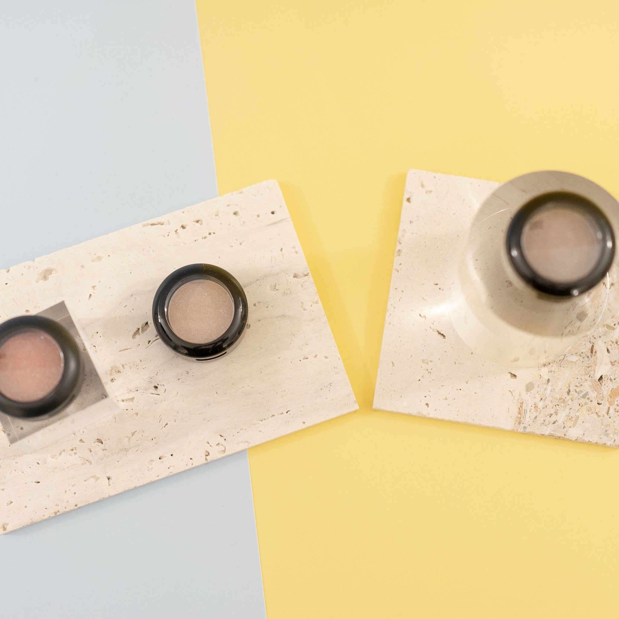 Sunset Peach eyeshadow pan displayed on a sleek black compact with reflective surface