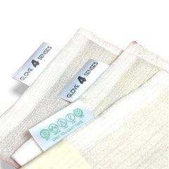 Cloth squares with textured material, off-white color, and "GLOVE 4 SENSES" labels