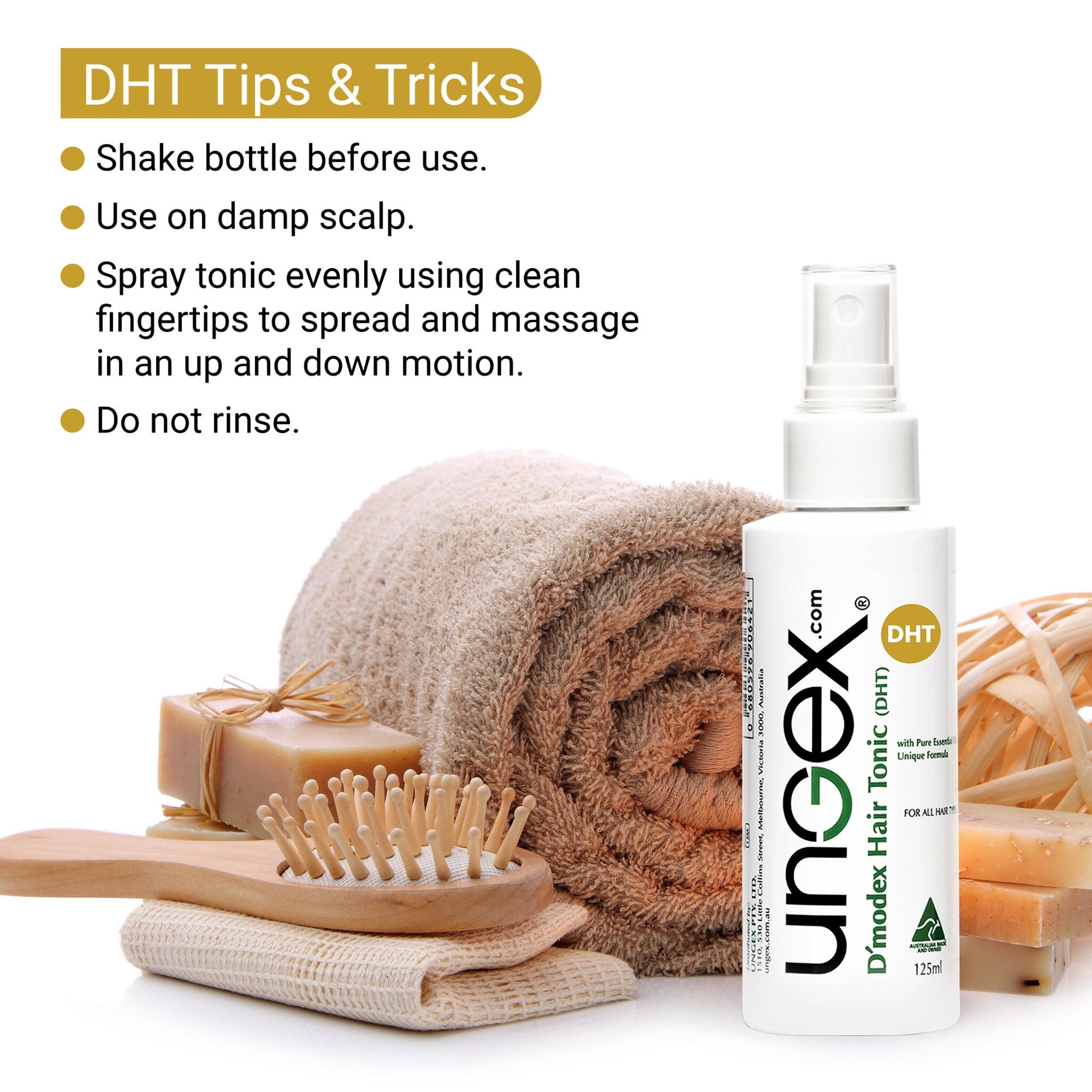 Close-up of hand applying demodex hair tonic to scalp with fingertips, showcasing lightweight amber liquid texture