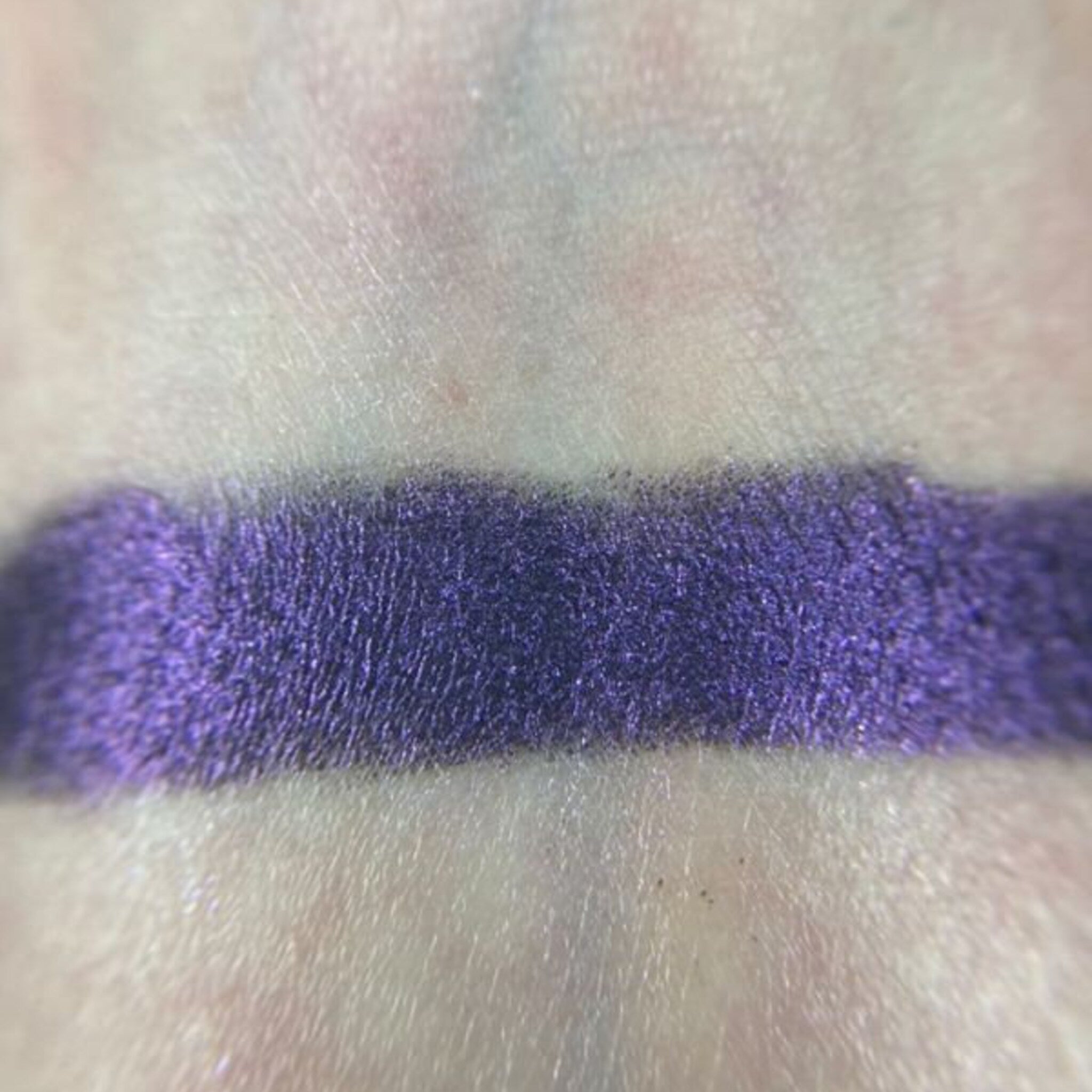Close-up of Flashdance Eye Shadow Palette showing six vibrant matte and shimmer shades in warm bronze and plum tones