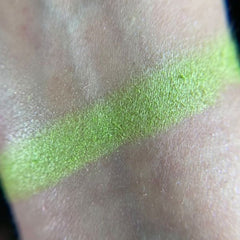 Close-up of vibrant soup-inspired eyeshadow palette showing rich matte and shimmer shades in warm tones