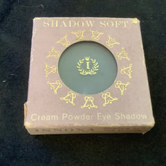 Eye shadow powder in blue, box with gold decorative pattern, Innoxa brand name visible
