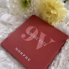 Vintage Rose 9V Eye Shadow palette showing nine rosy matte and shimmer powder shades in sleek black compact