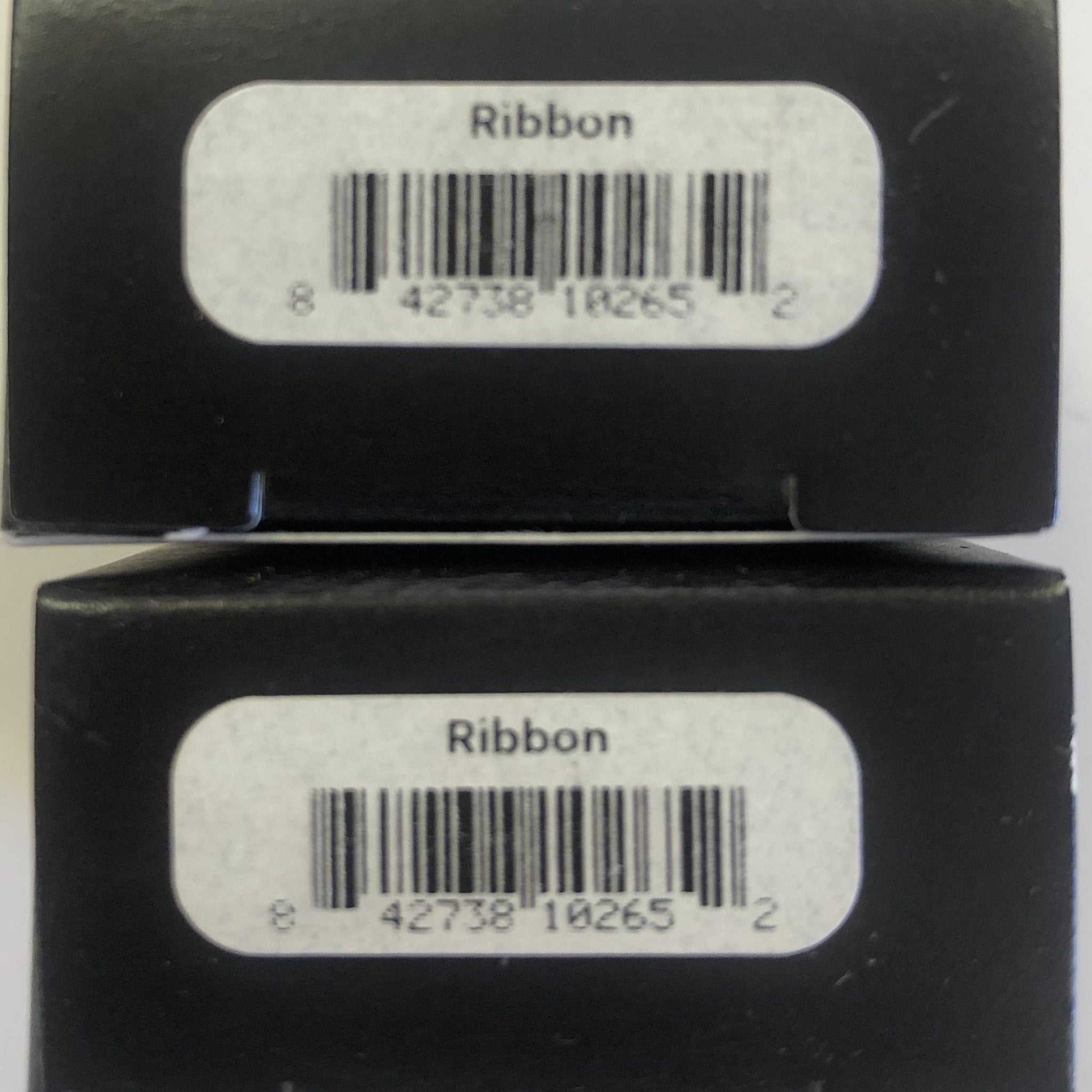 Side view of Glo Skin Beauty Eye Shadow compact in sleek black packaging with silver logo, showing product thickness