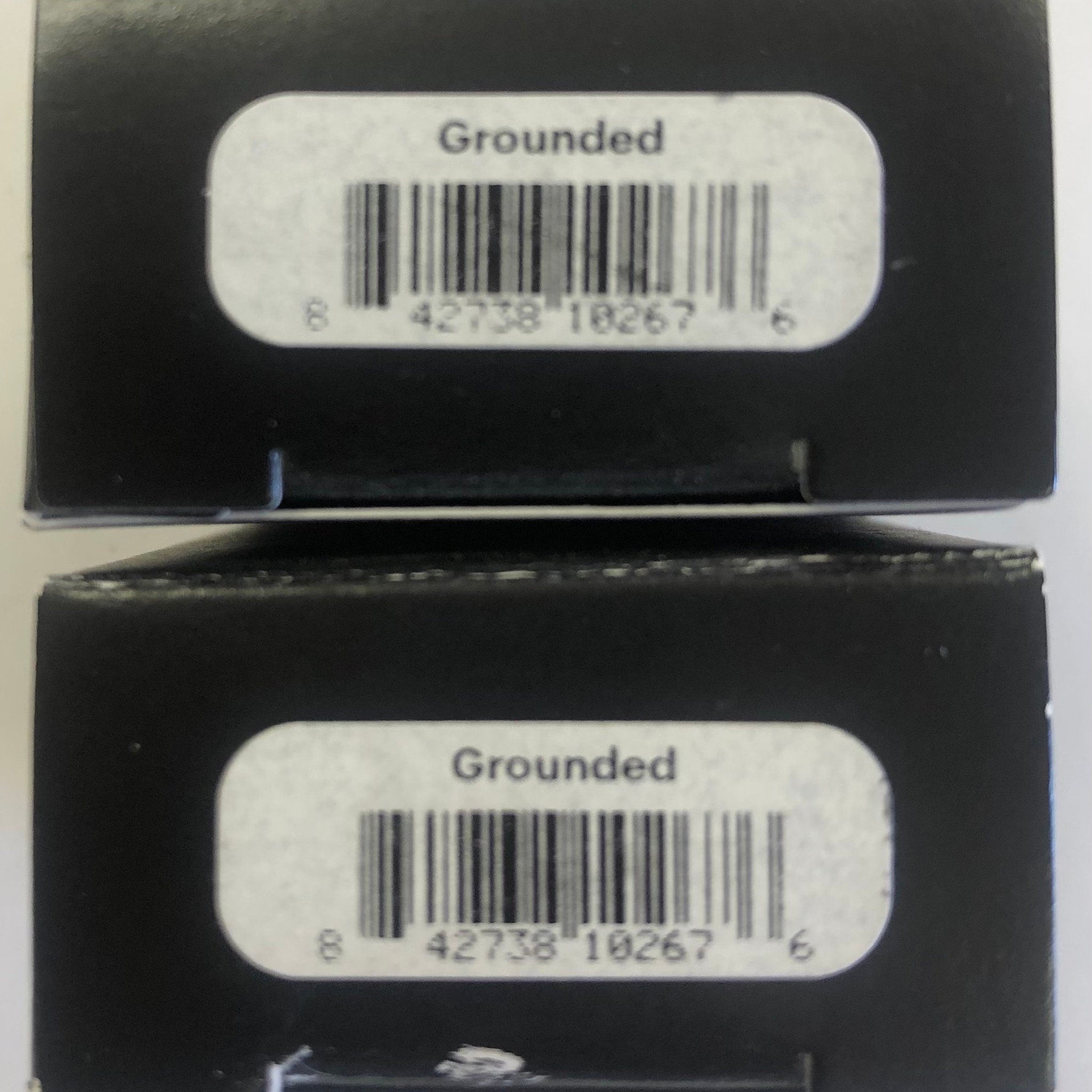Side view of Glo Skin Beauty Eye Shadow compact showing sleek black packaging and product thickness