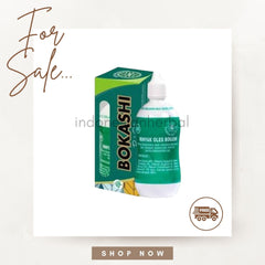 Heat rub oil bottle with green and white label, Bokashi brand visible, for sale