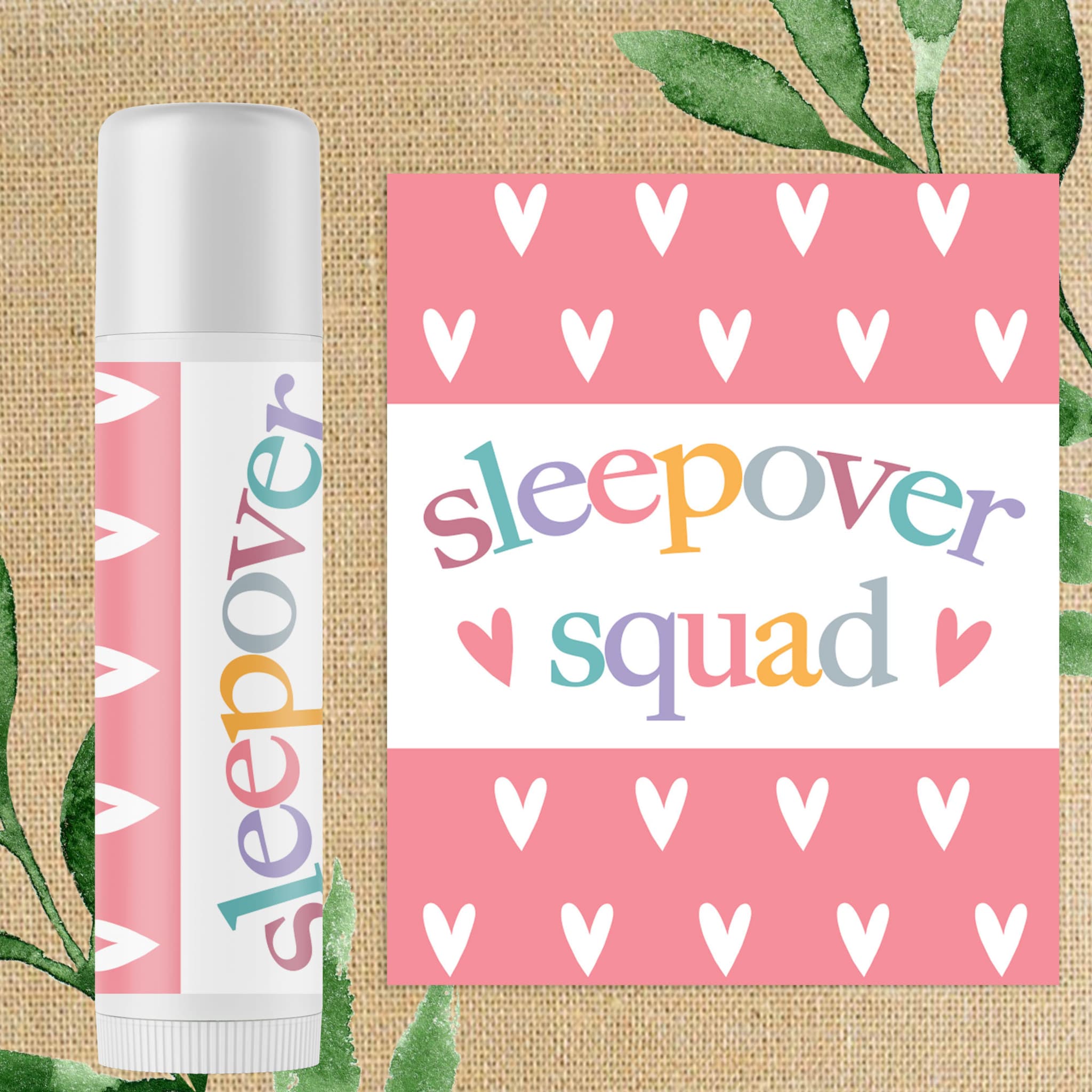 Lip balm with pink and white heart pattern, "Sleepover" text, and white tube design