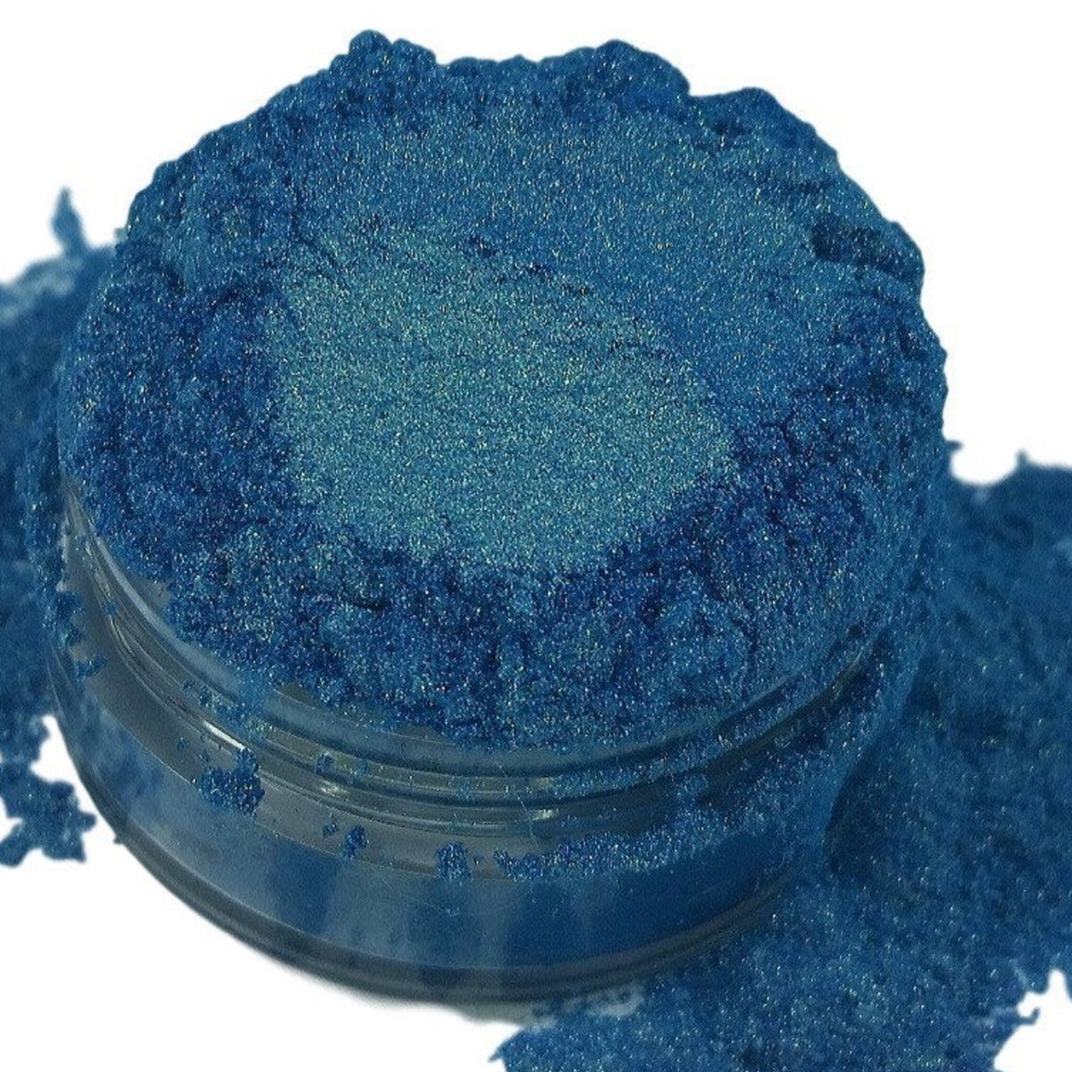 Metallic blue gold eyeshadow pot with iridescent mermaid shimmer and smooth mineral texture