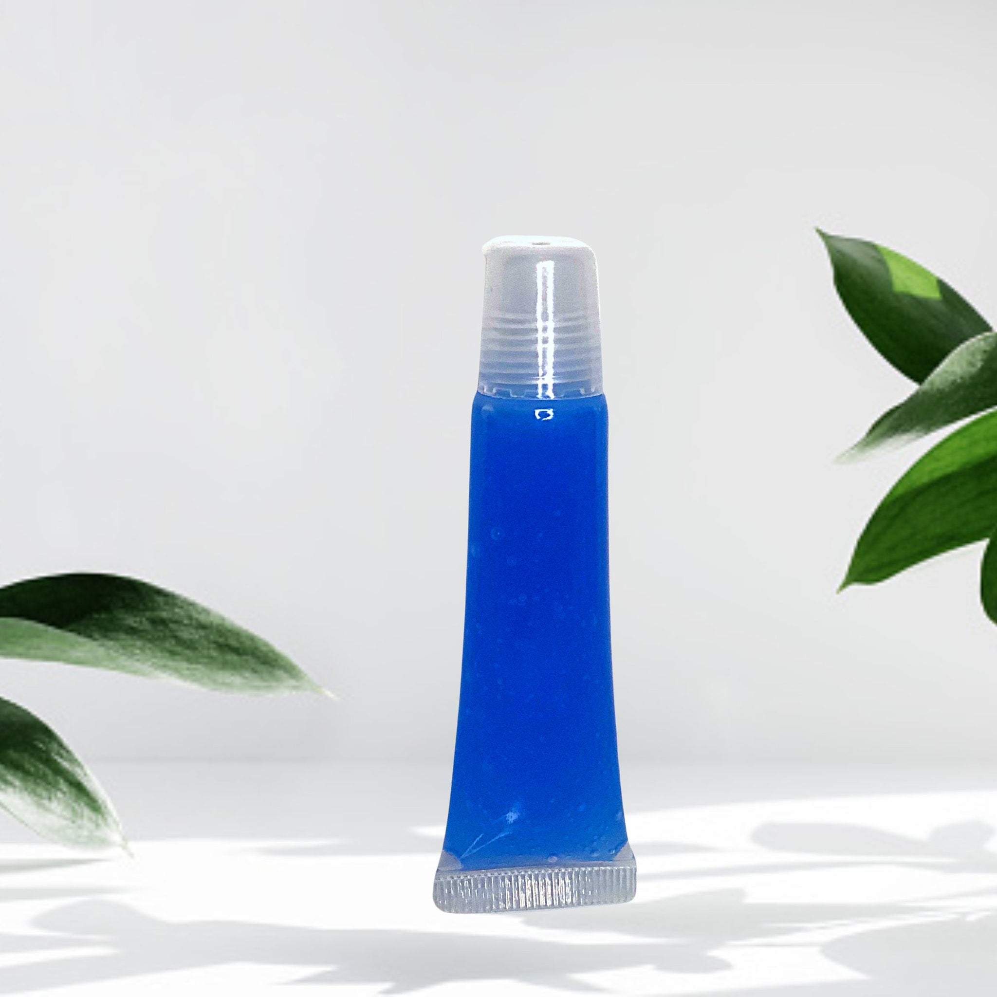 Lip gloss tube with blue liquid, clear cap, and plastic tube base