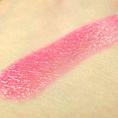 Close-up of Miwako Mineral Pigment Eye Shadow showing finely milled powder texture in a vibrant jewel-toned shade