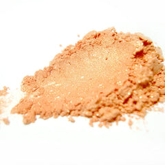 Peach mineral eye shadow in compact with satin finish and soft shimmer particles
