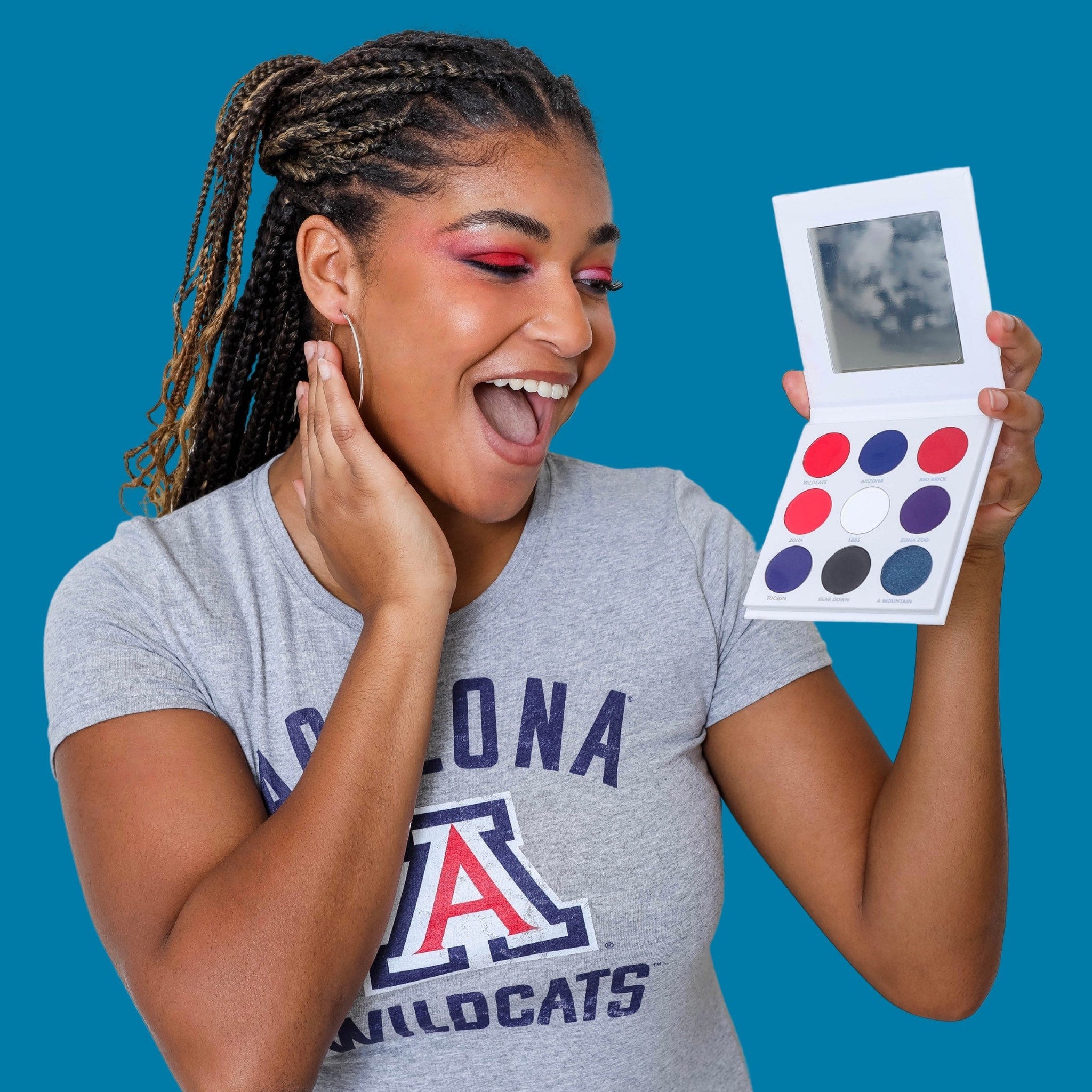 Close-up of Arizona University Eye Shadow palette showing pressed powder pans in warm desert hues with sleek black case