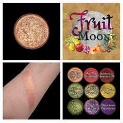 Front view of Fruit Moon Perfect Peach vegan eyeshadow in a peachy-pink compact with gold branding.