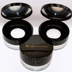 Black powder compacts with mirror, white puff, and gold text of BOA Body of Angels brand