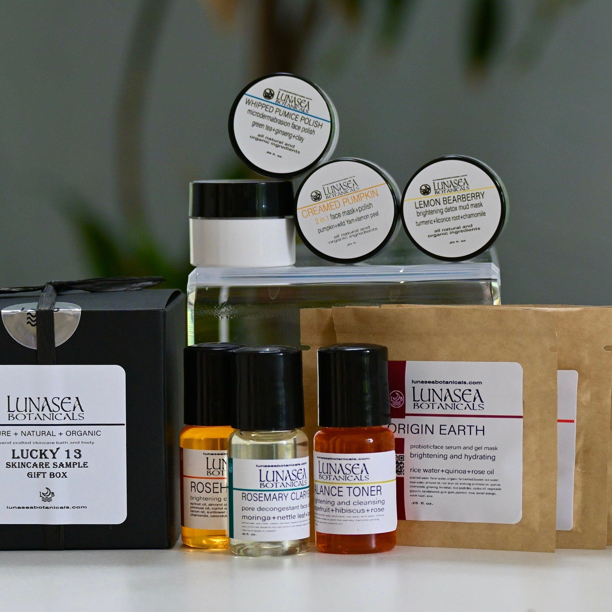Skin care sample box with black box, skincare bottles, and brand name Lunasea Botanicals