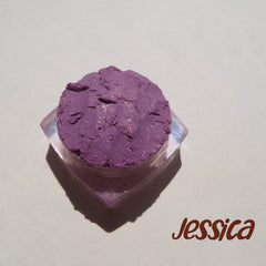 Jessica Pure Mineral Eyeshadow in purple shimmer loose pigment with vegan, cruelty-free label on sleek black jar