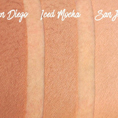 Side view of matte pressed eyeshadow pan showing smooth powder surface and 26mm circular compact