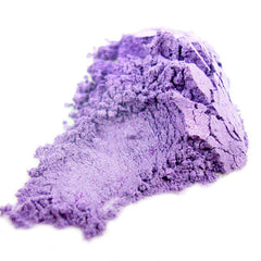 Bittie Mineral Pigment Eye Shadow in a compact with shimmering powder and sleek black packaging