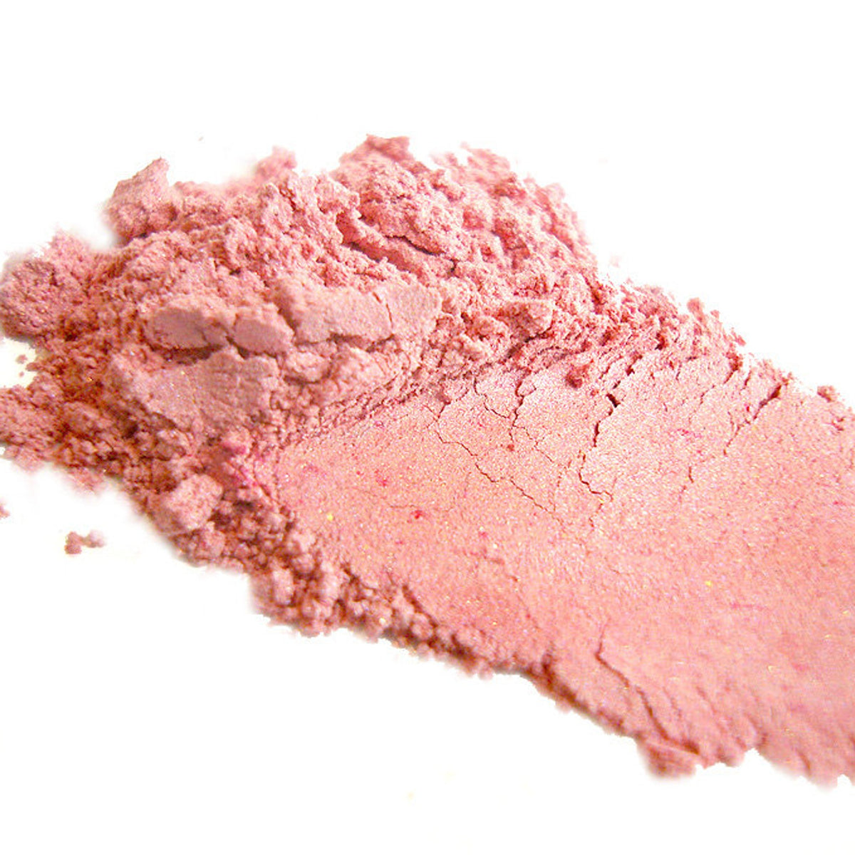 Close-up of Candy Darling mineral eye shadow in a vibrant shade with smooth, pigmented powder texture and compact packaging
