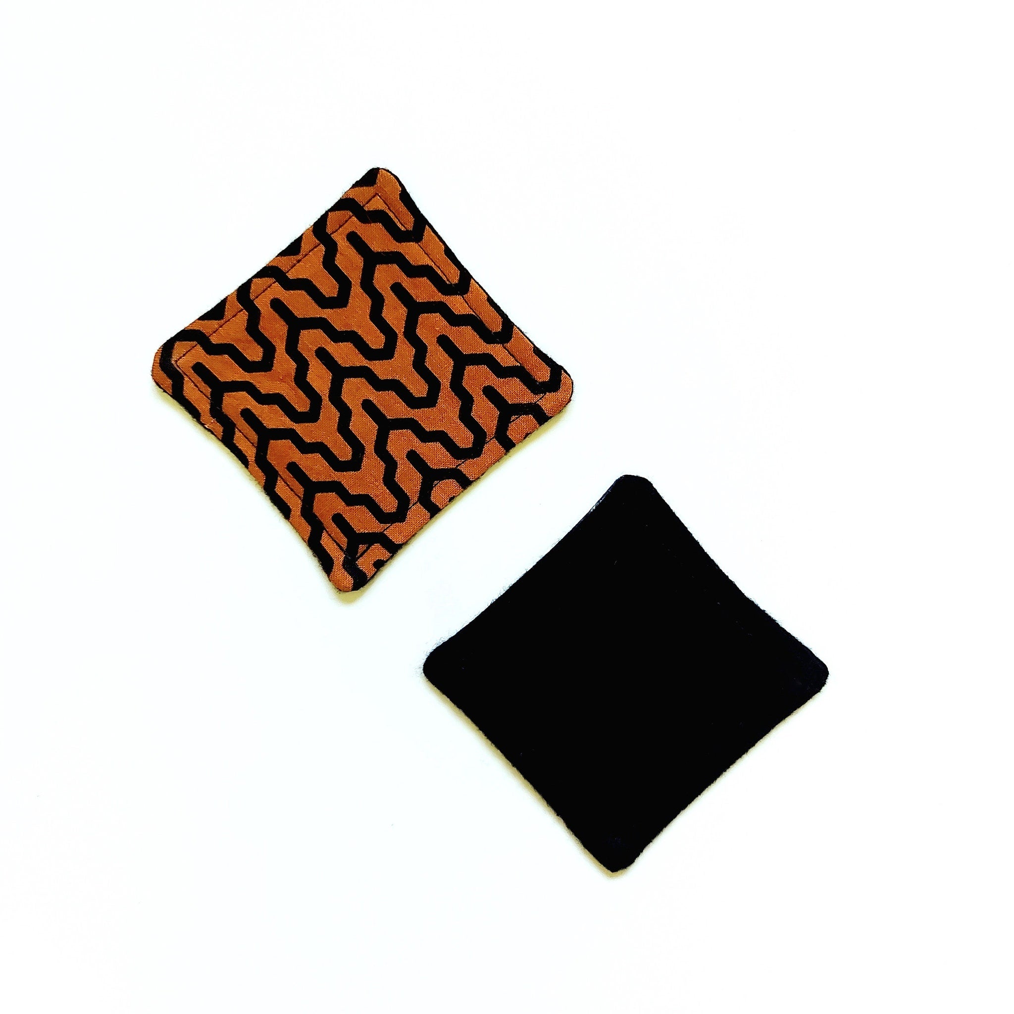 Coasters, orange and black patterned fabric, black solid fabric, square shape