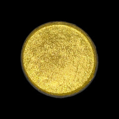 Side view of Fruit Moon vegan eyeshadow single in pear shade, showcasing compact size and matte finish.