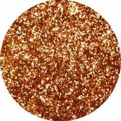 Close-up of Chromalight Pressed Glitter Eye Shadow in a compact, showcasing radiant shimmer particles