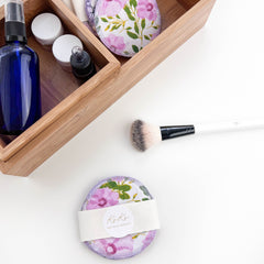 Reusable makeup pads with floral pattern, KOKO brand, and white wrap on white surface