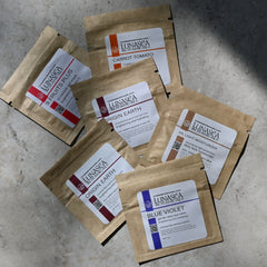 Face mask packets in brown paper with white labels, LUNASEA BOTANICALS brand name visible