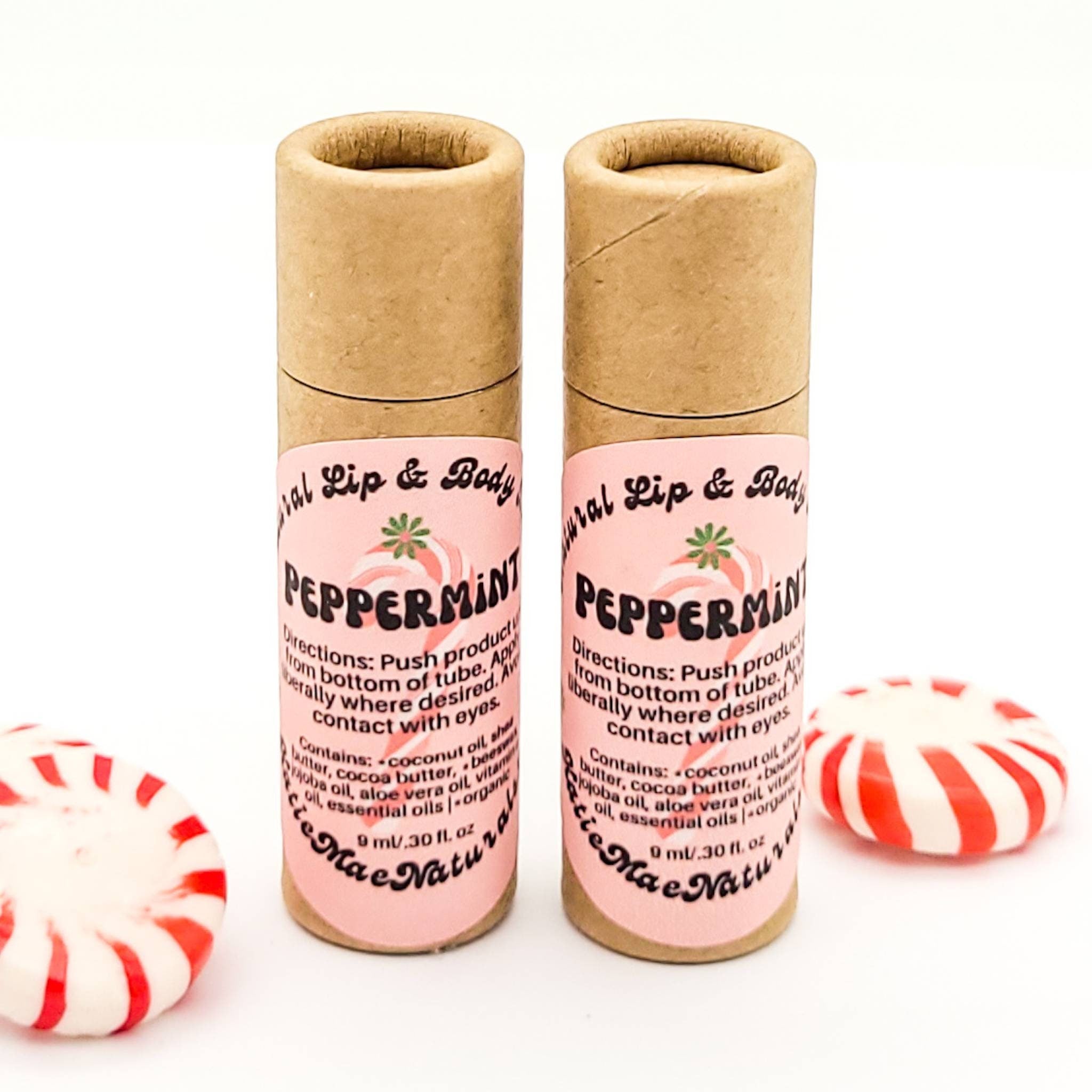Lip balm tubes in brown cardboard with pink label and peppermint candy, Mae Naturals brand