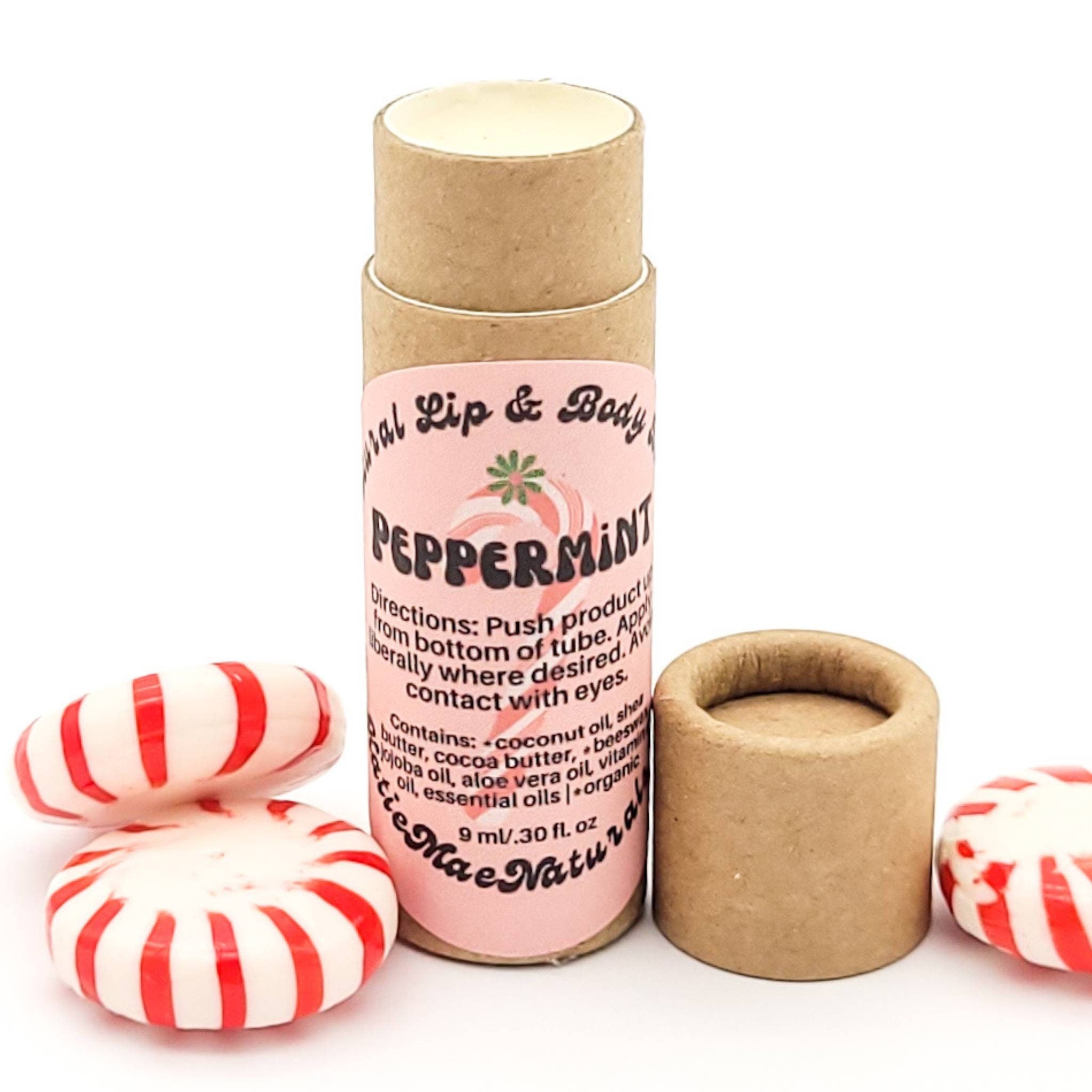Lip balm tube with brown cardboard, pink label, and peppermint candies with red stripes