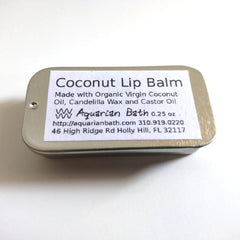 Coconut lip balm in metal tin with white label and Aquarian Bath text