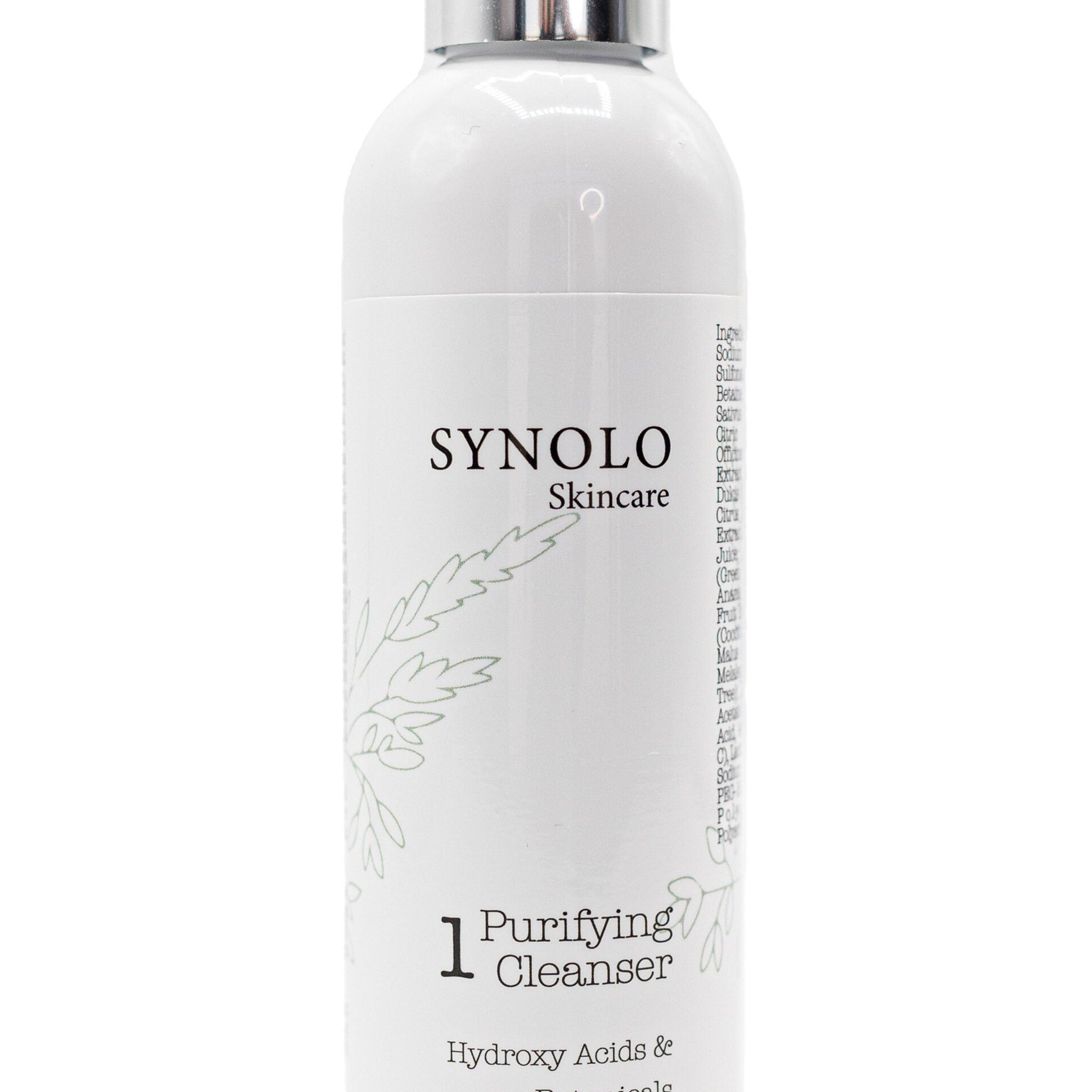 Purifying cleanser bottle, white with silver cap, Synolo Skincare branding and green leaf design