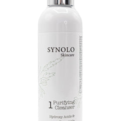 Purifying cleanser bottle, white with silver cap, Synolo Skincare branding and green leaf design