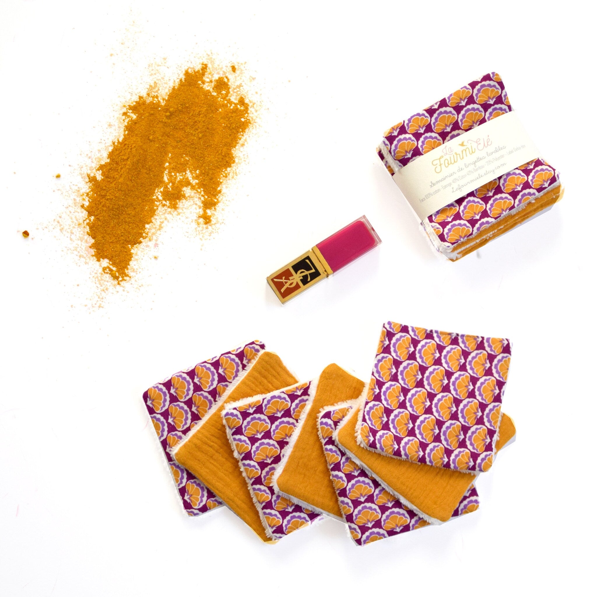 Reusable face wipes with purple and orange floral pattern, La Fourmi Elé branding, and yellow backing
