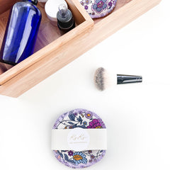 Reusable makeup remover pads with floral pattern, white band, and Koko brand label on white surface