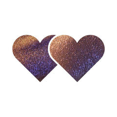 Pressed eyeshadow pan with shimmering purple-olive chameleon color shift and sparkling finish