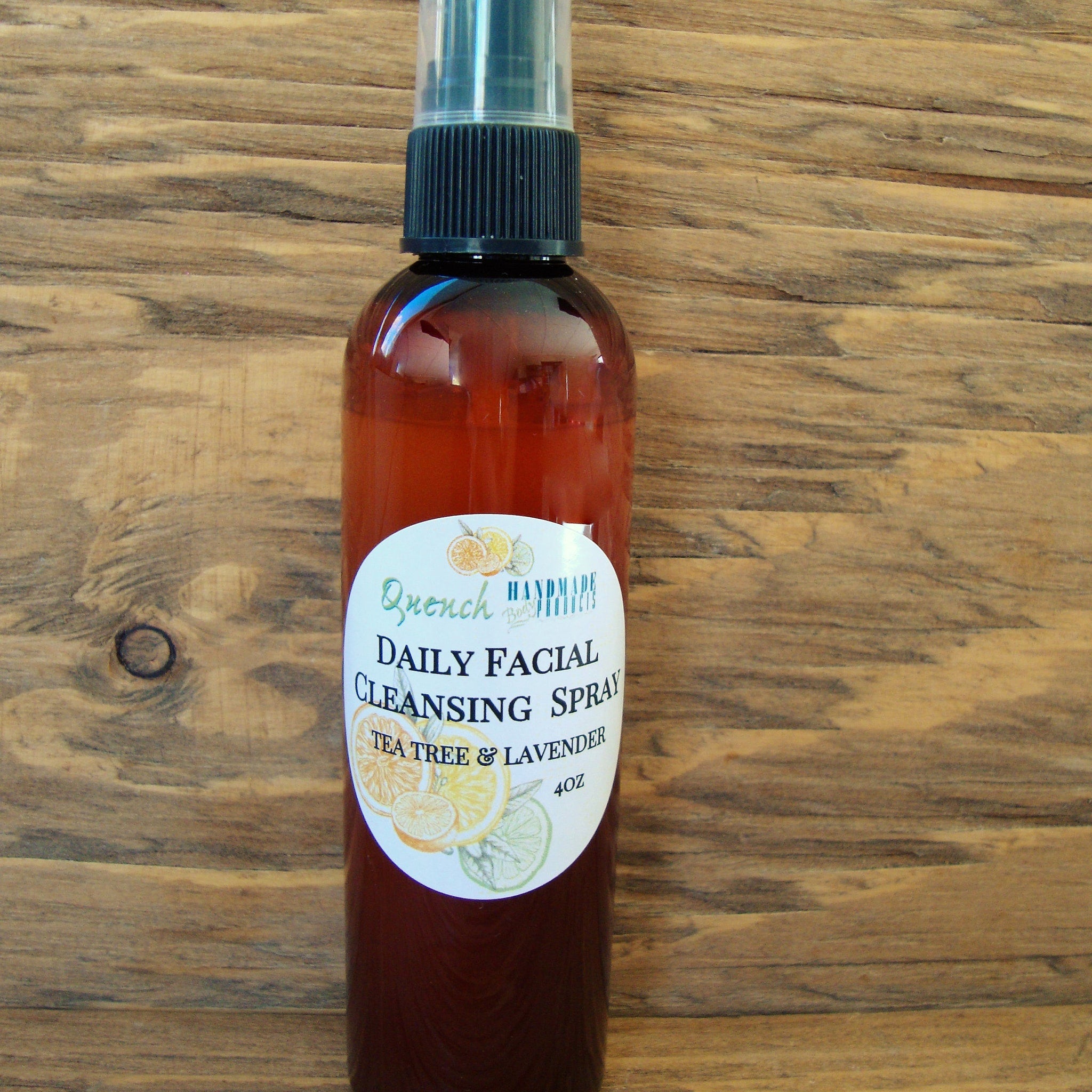Facial Cleansing Spray bottle, brown glass, black cap, with label "Quench Handmade