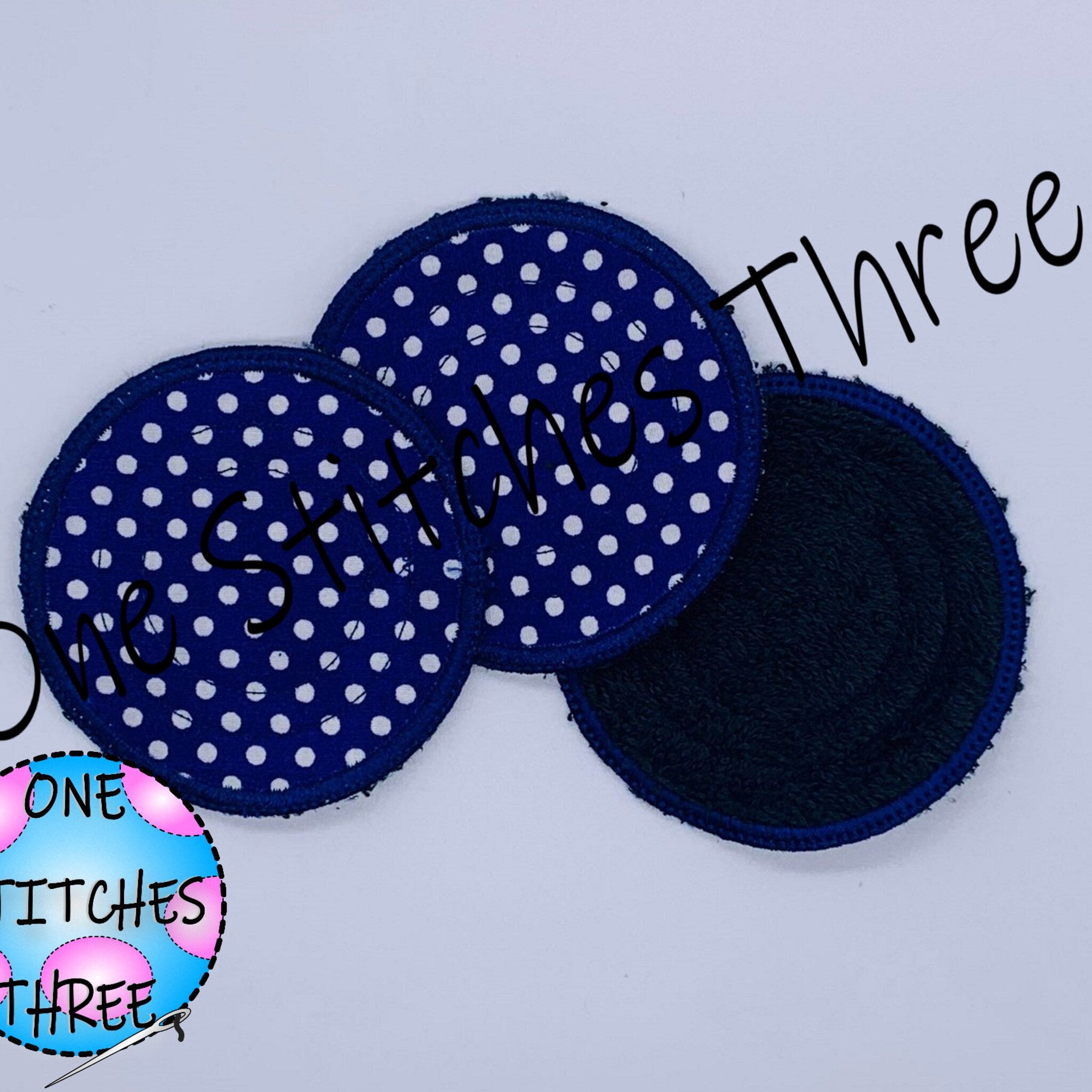 Reusable facial rounds in blue polka dot and dark blue terry cloth, One Stitches Three brand