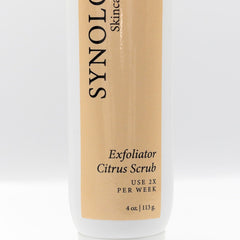 Exfoliator bottle with white and tan label, vertical text, and product information
