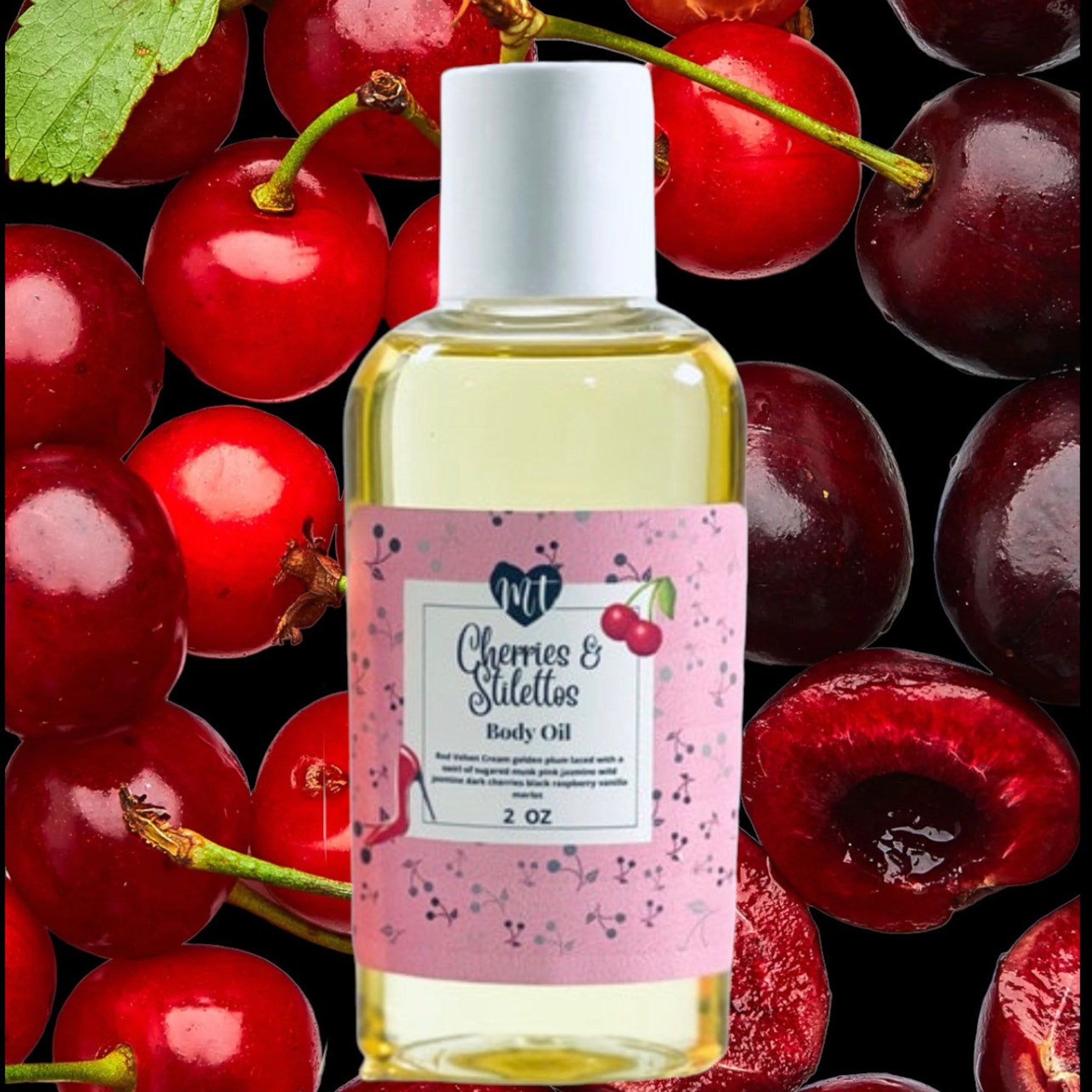 Body oil bottle with white cap, pink label, and red cherry background, Cherries & Stilettos brand