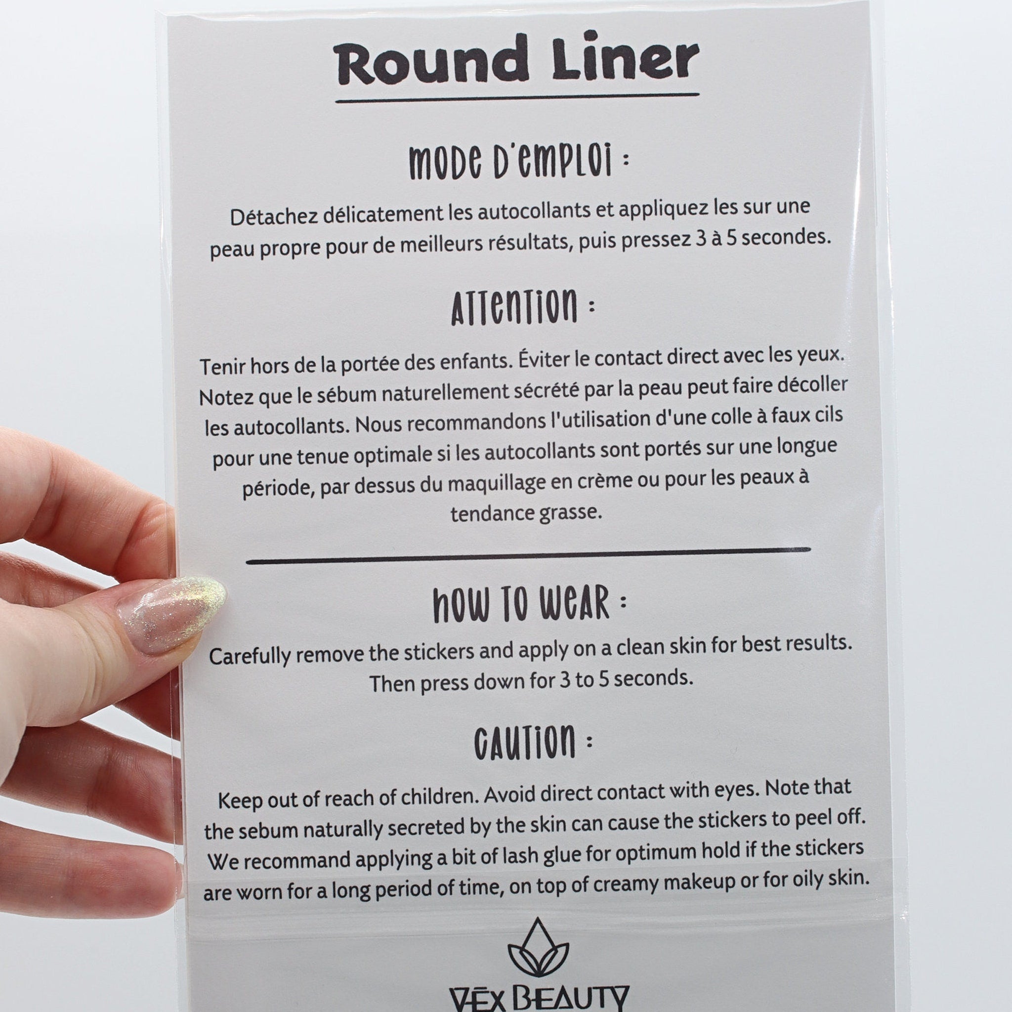 Round Liner instructions on white paper, held by hand, Vex Beauty logo visible