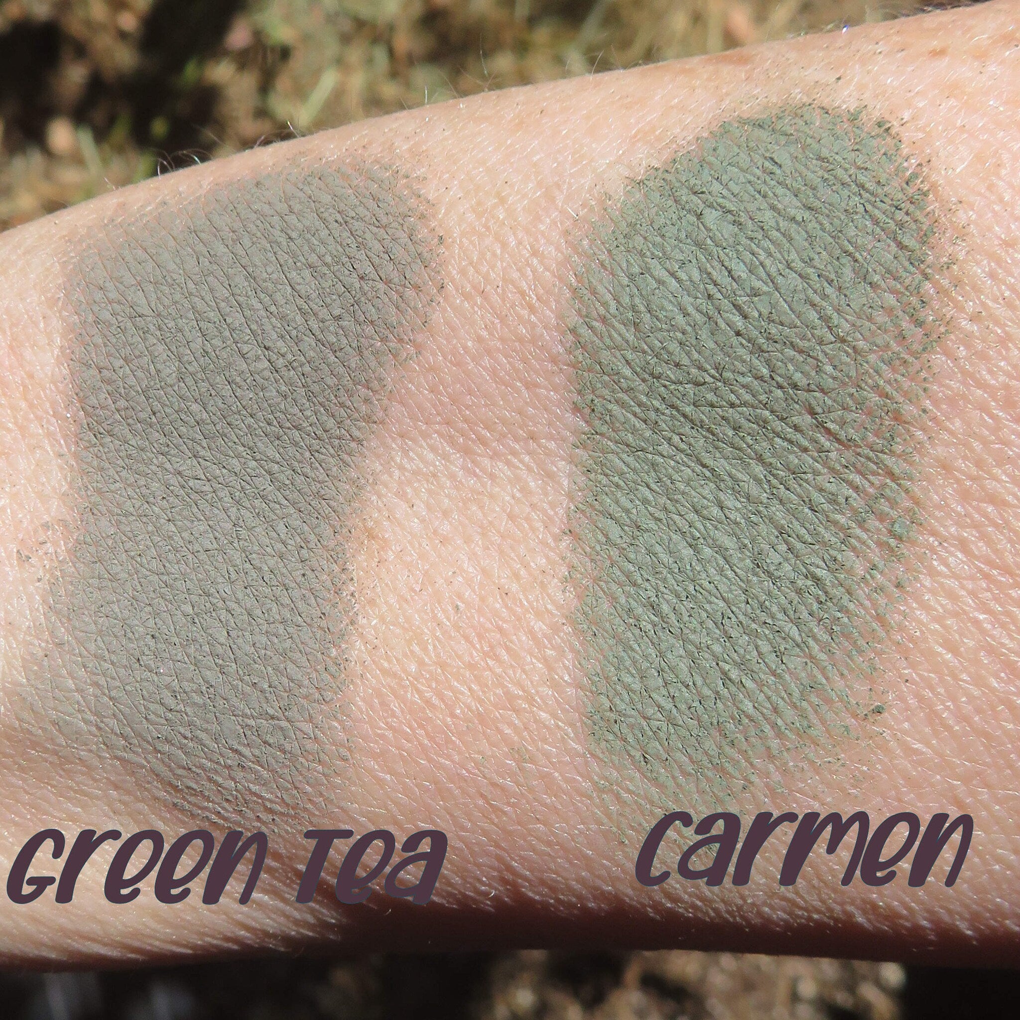 Dark matte green tea loose mineral eyeshadow in open jar with soft mica powder texture