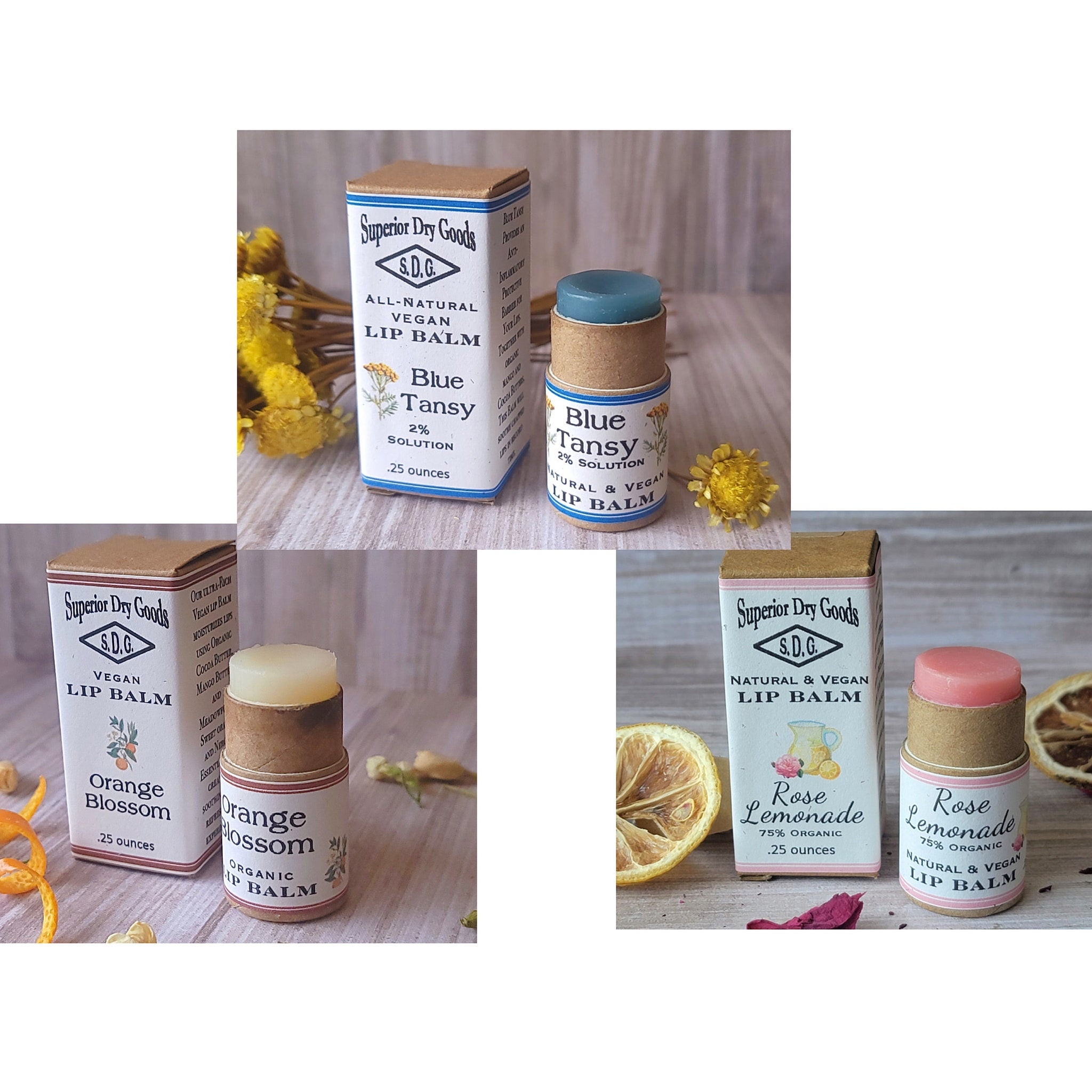 Lip balm in blue, brown, and white packaging with "Superior Dry Goods" text visible