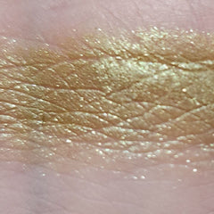 Side view of Eye of Newt Shadow Palette showcasing six matte and shimmer eyeshadows in earthy tones with embossed logo