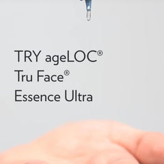 ageLOC Tru Face Essence Ultra text on white background with liquid drop, hand visible