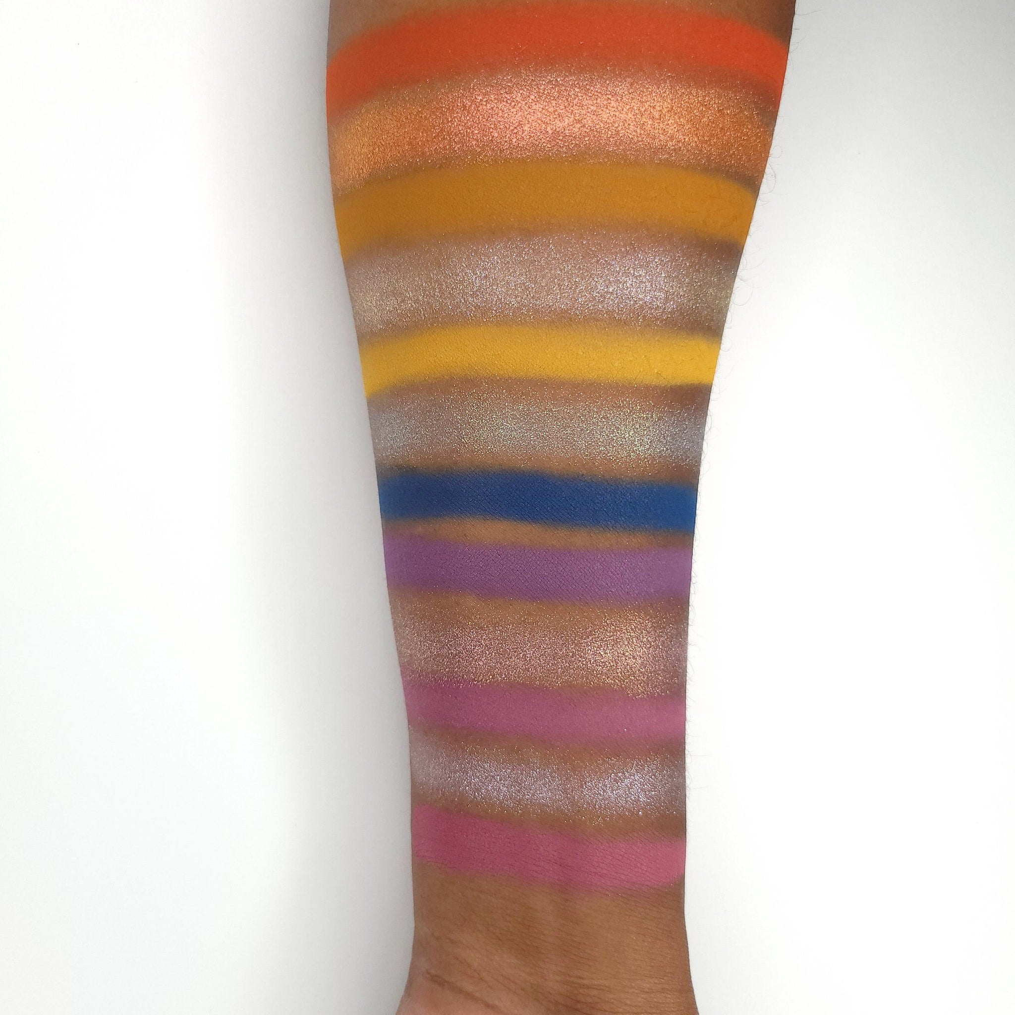 Side view of Fruitful End, Sweet Beginning Eye Shadow palette showing textured powder surface and gradient color blend