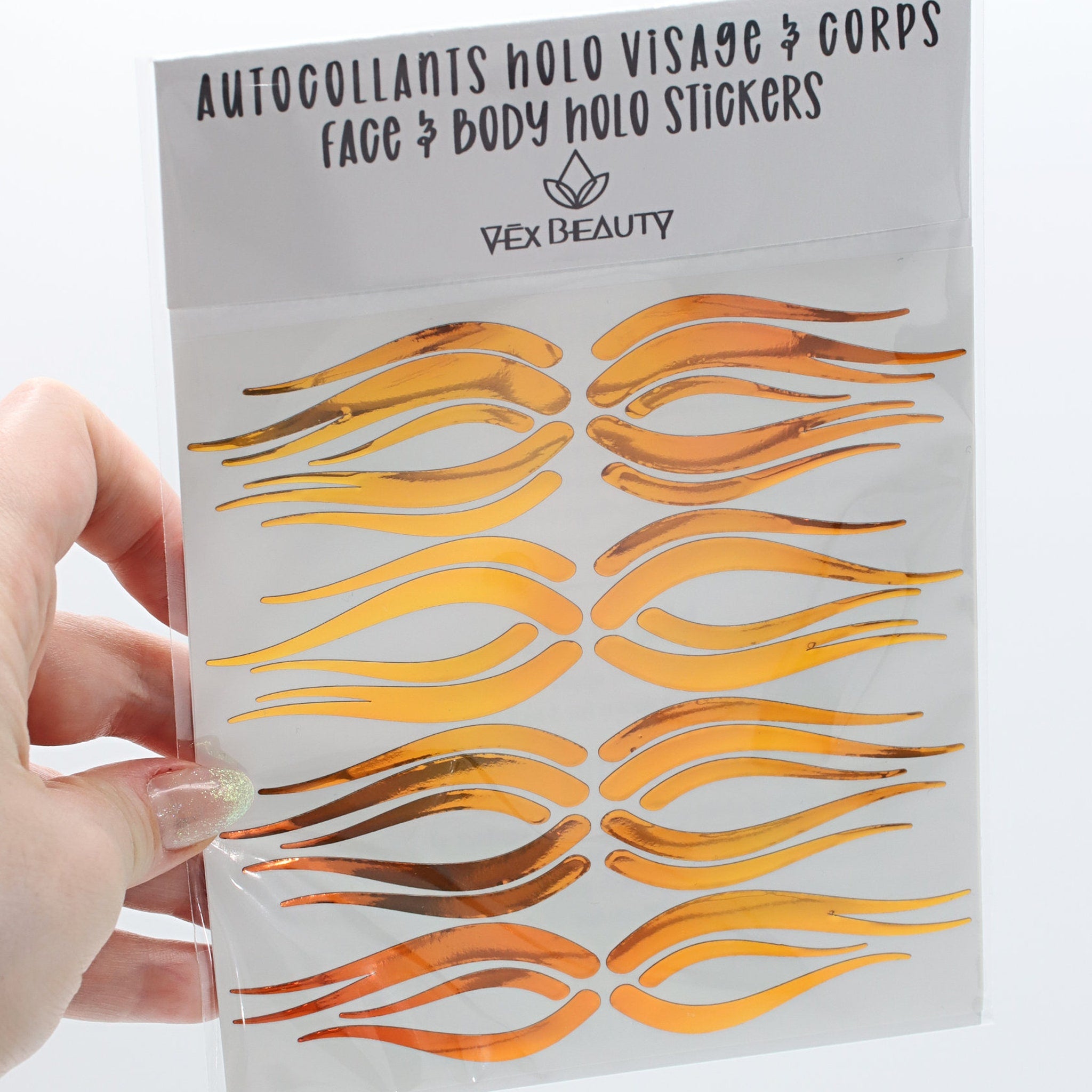 Face and body holo stickers in orange and gold metallic, Vex Beauty brand, curved shape