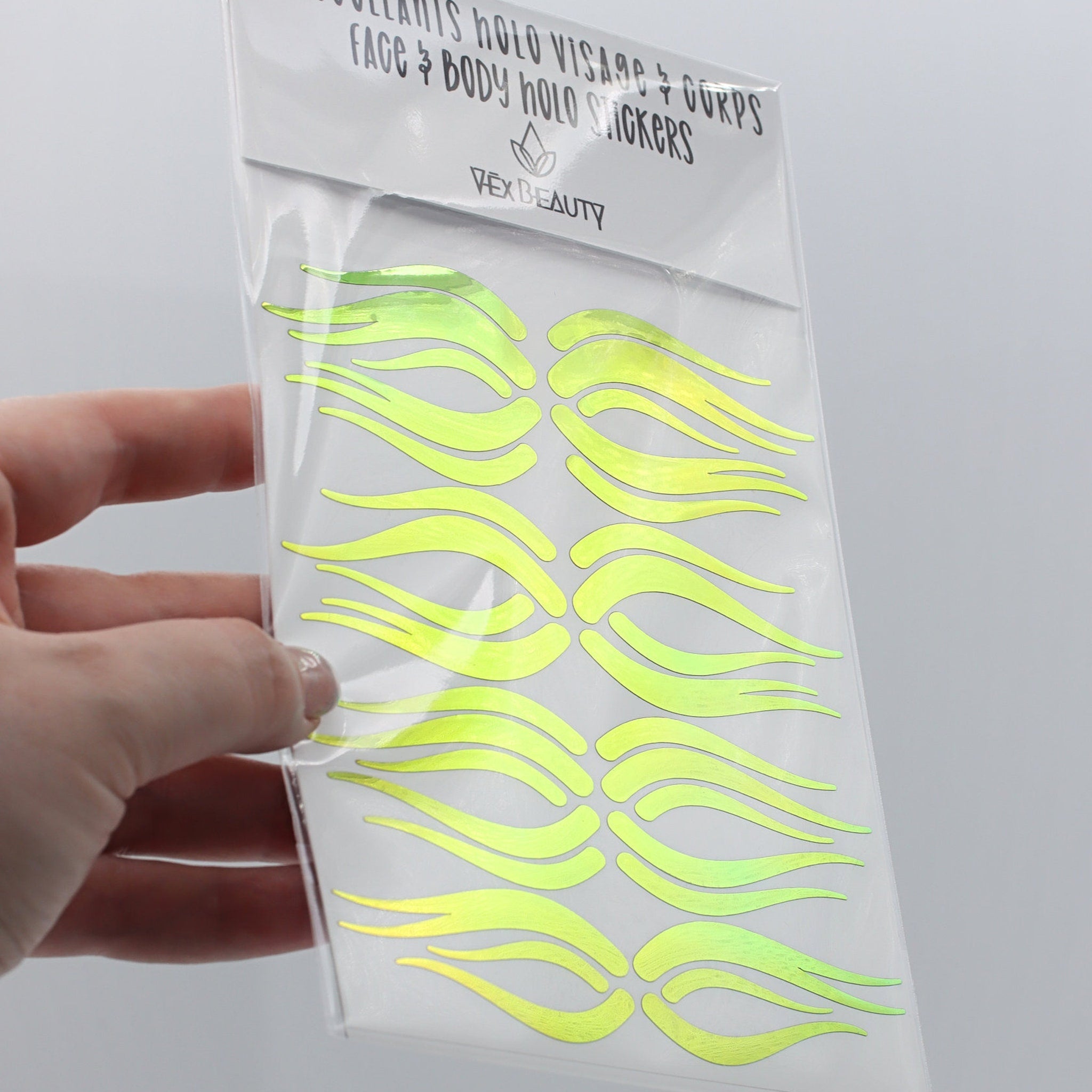 Face and body holo stickers, neon green iridescent flame design, Vex Beauty brand