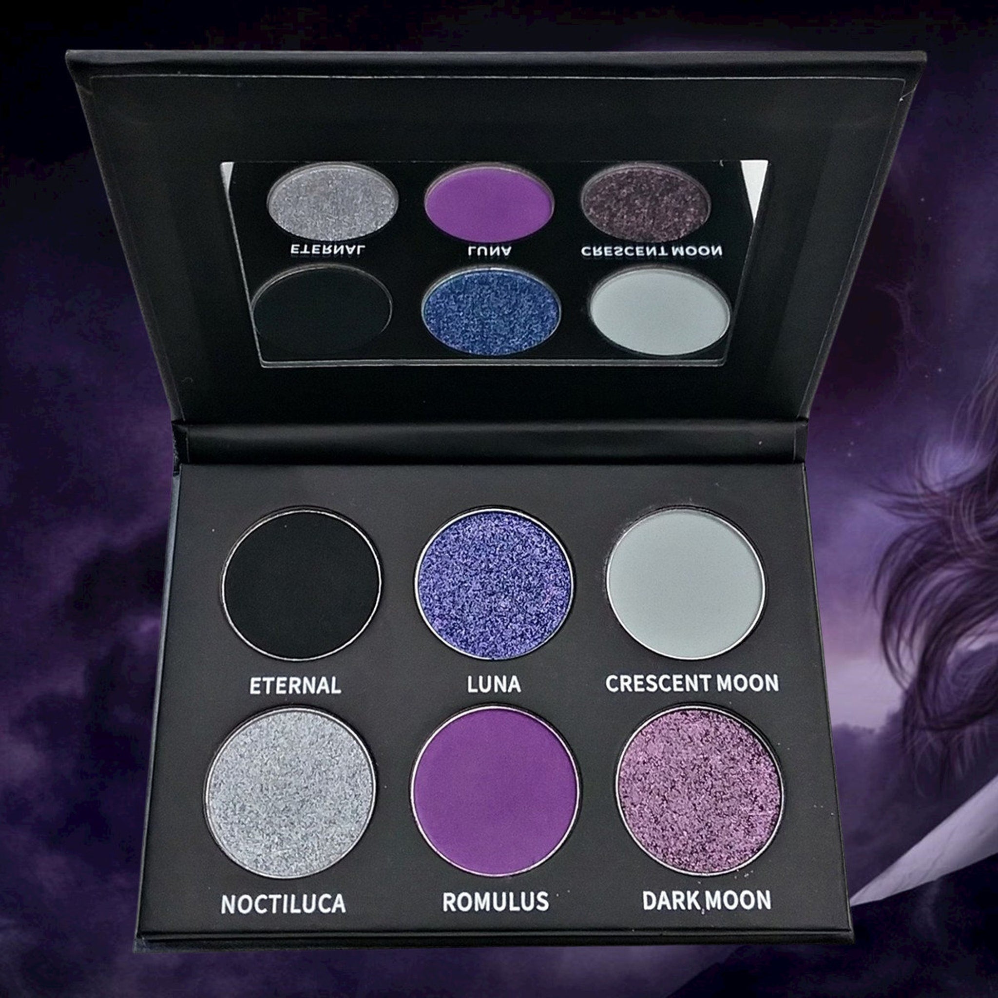 Close-up of Luna Eyeshadow Palette showing shimmering bronze and plum shades with smooth, blendable texture